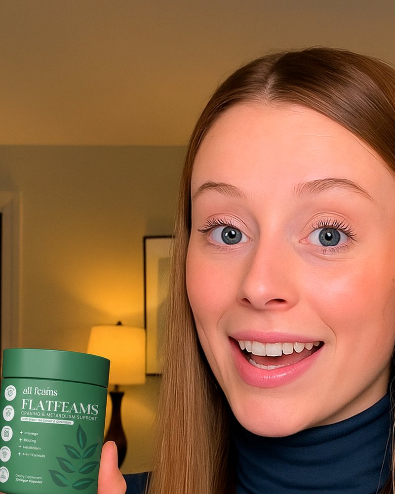 A smiling woman holding the jar